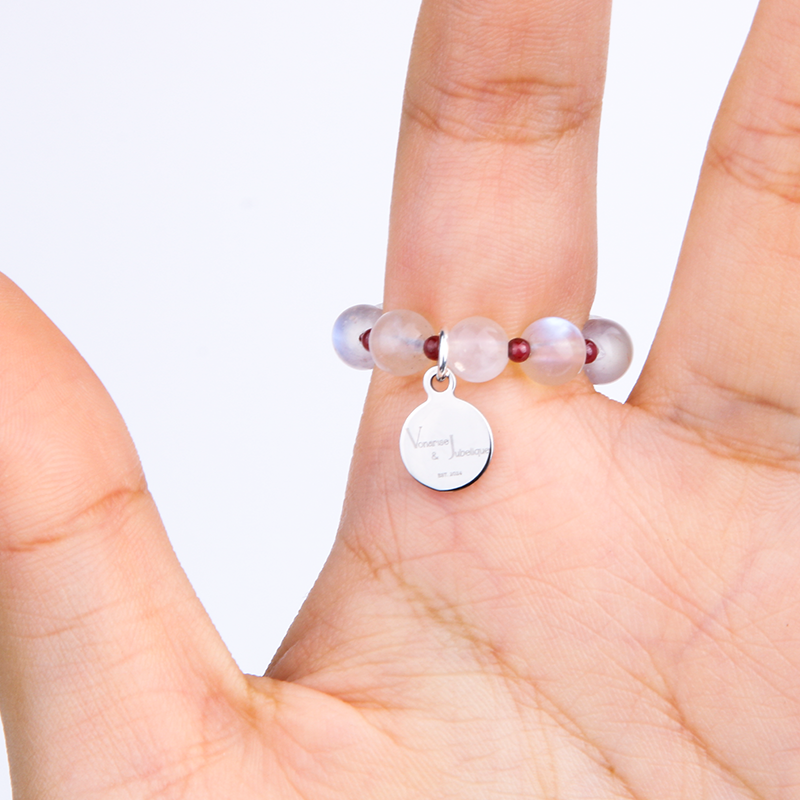 garnet with blue moonstone for passion energy and femeini serenity