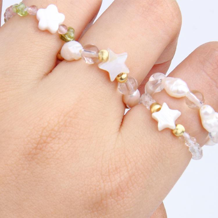 clear quartz with 18k gold threaded beads with mother of pearl and pearl