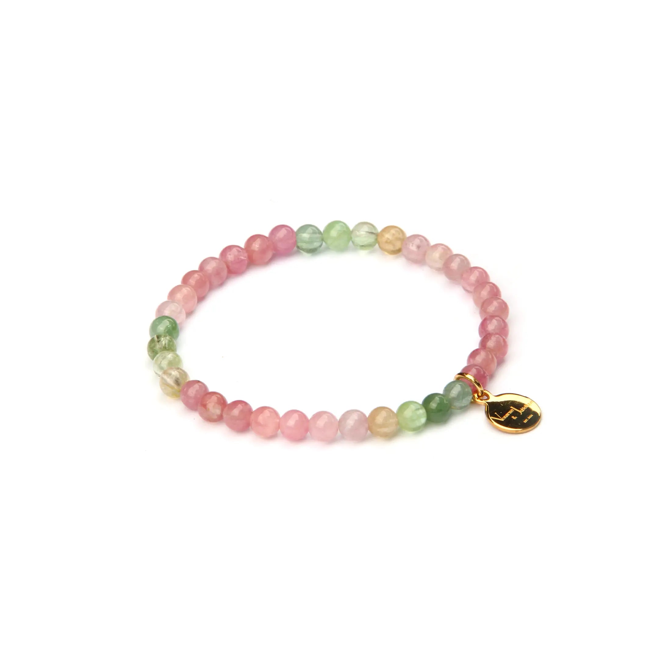 A beaded stretch bracelet featuring a gradient of pastel pink, green, and yellow beads, finished with a small gold-toned oval charm engraved with a crescent moon, shown on a plain white background.