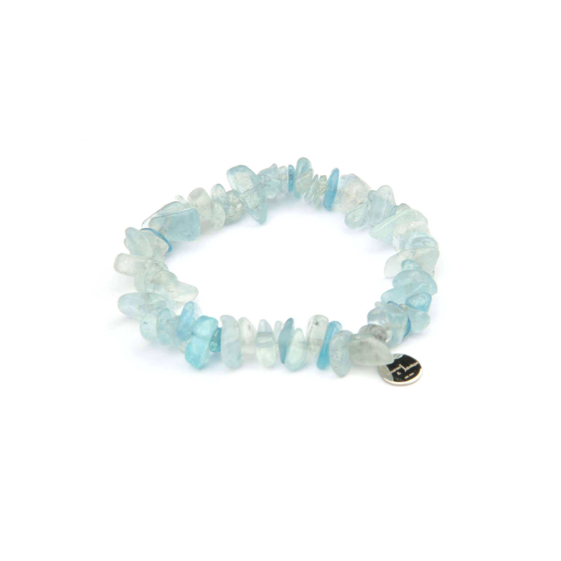 Minimalist chip crystal bracelet with raw-shaped aquamarine, featuring tranquil blue tones and calming oceanic crystal energy