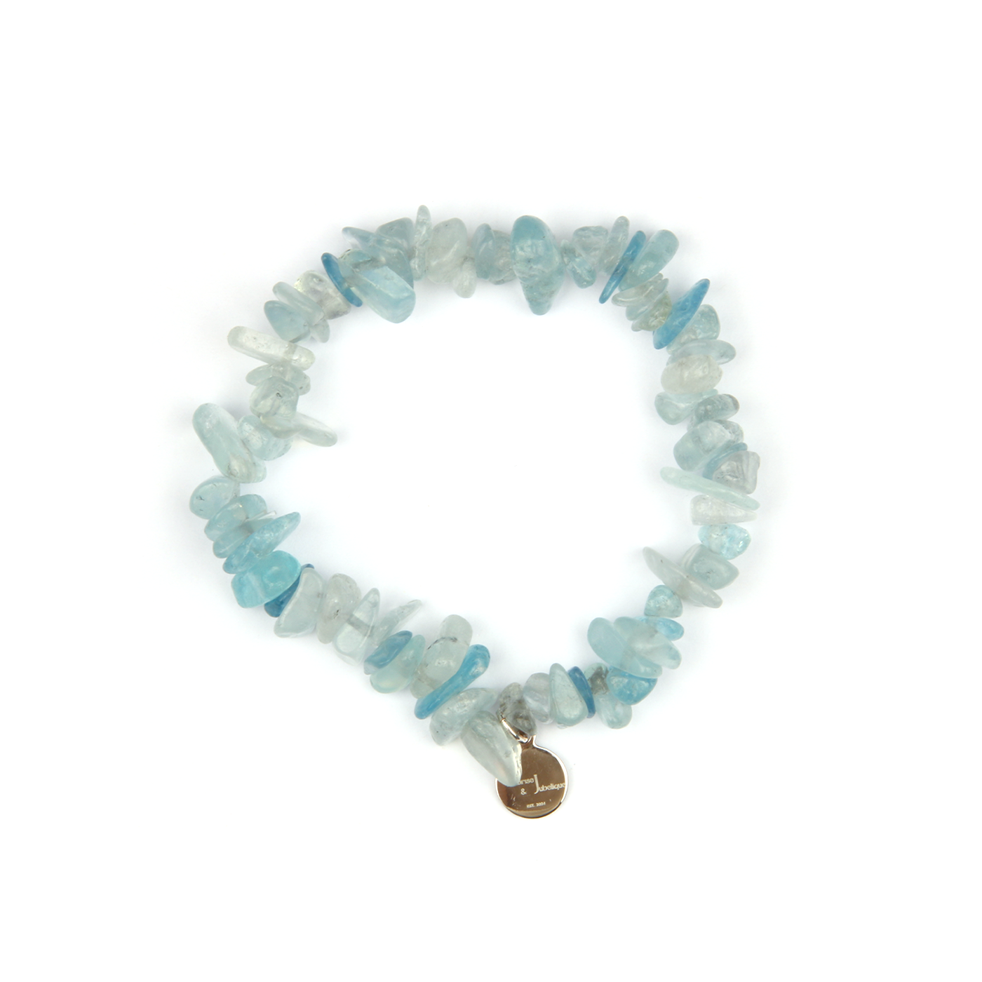 Minimalist chip crystal bracelet with raw-shaped aquamarine, featuring tranquil blue tones and calming oceanic crystal energy