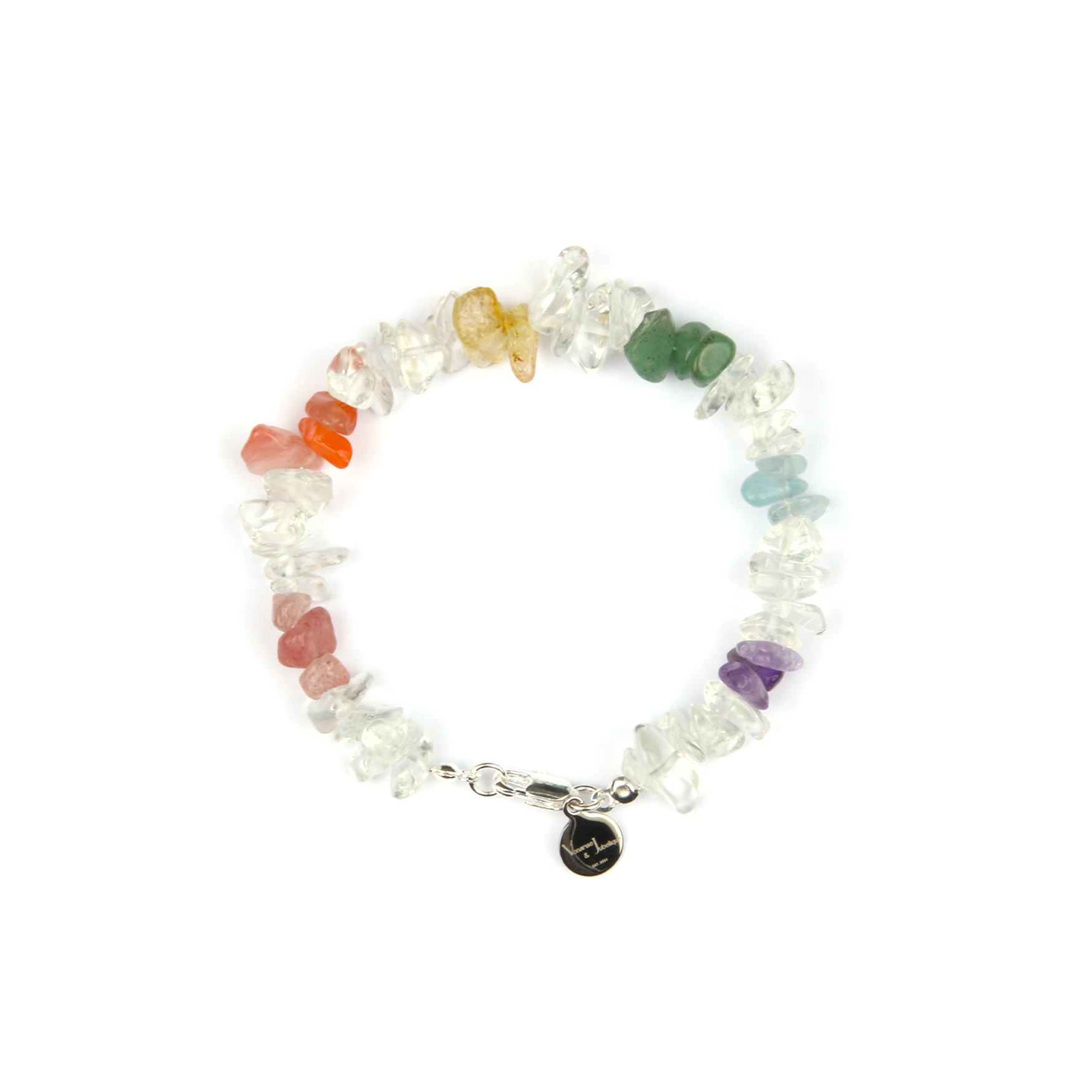 Rainbow chip crystal bracelet with raw-shaped clear quartz, strawberry rose quartz, red agate, citrine, aventurine, aquamarine, and amethyst in a minimalist design