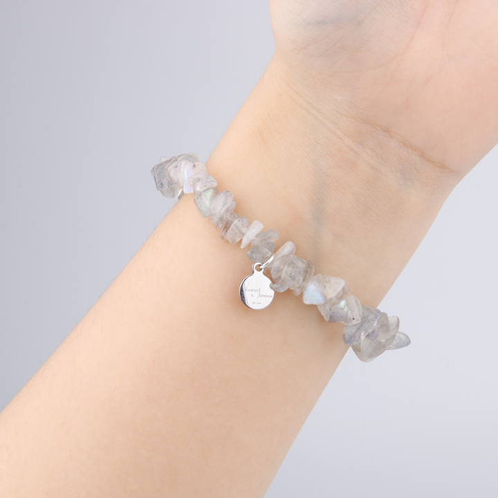 Minimalist chip crystal bracelet with raw-shaped gray moonstone, offering a soft shimmer and calming crystal aesthetic