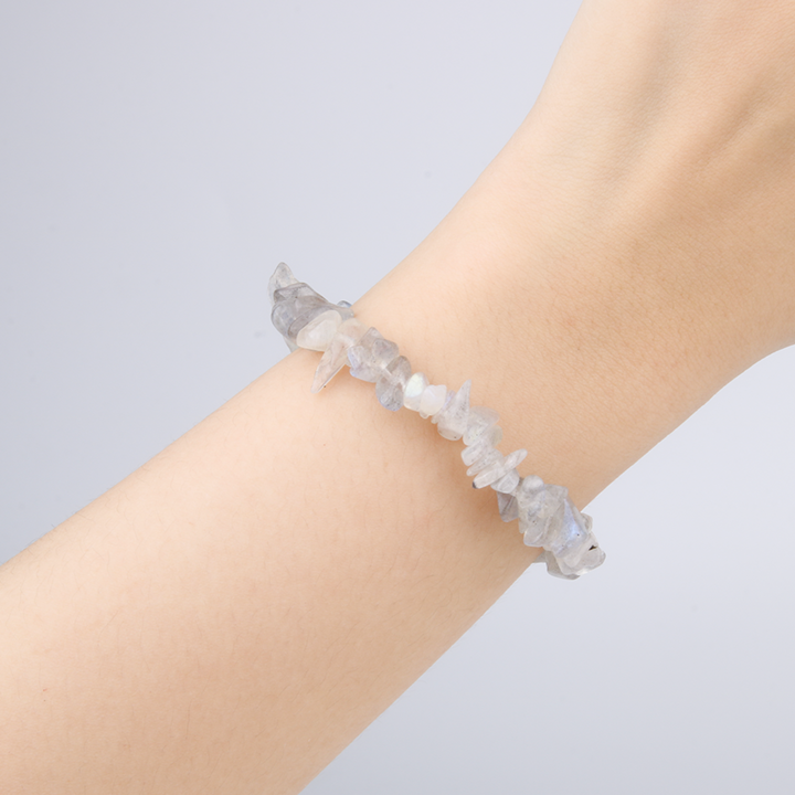 Minimalist chip crystal bracelet with raw-shaped gray moonstone, offering a soft shimmer and calming crystal aesthetic
