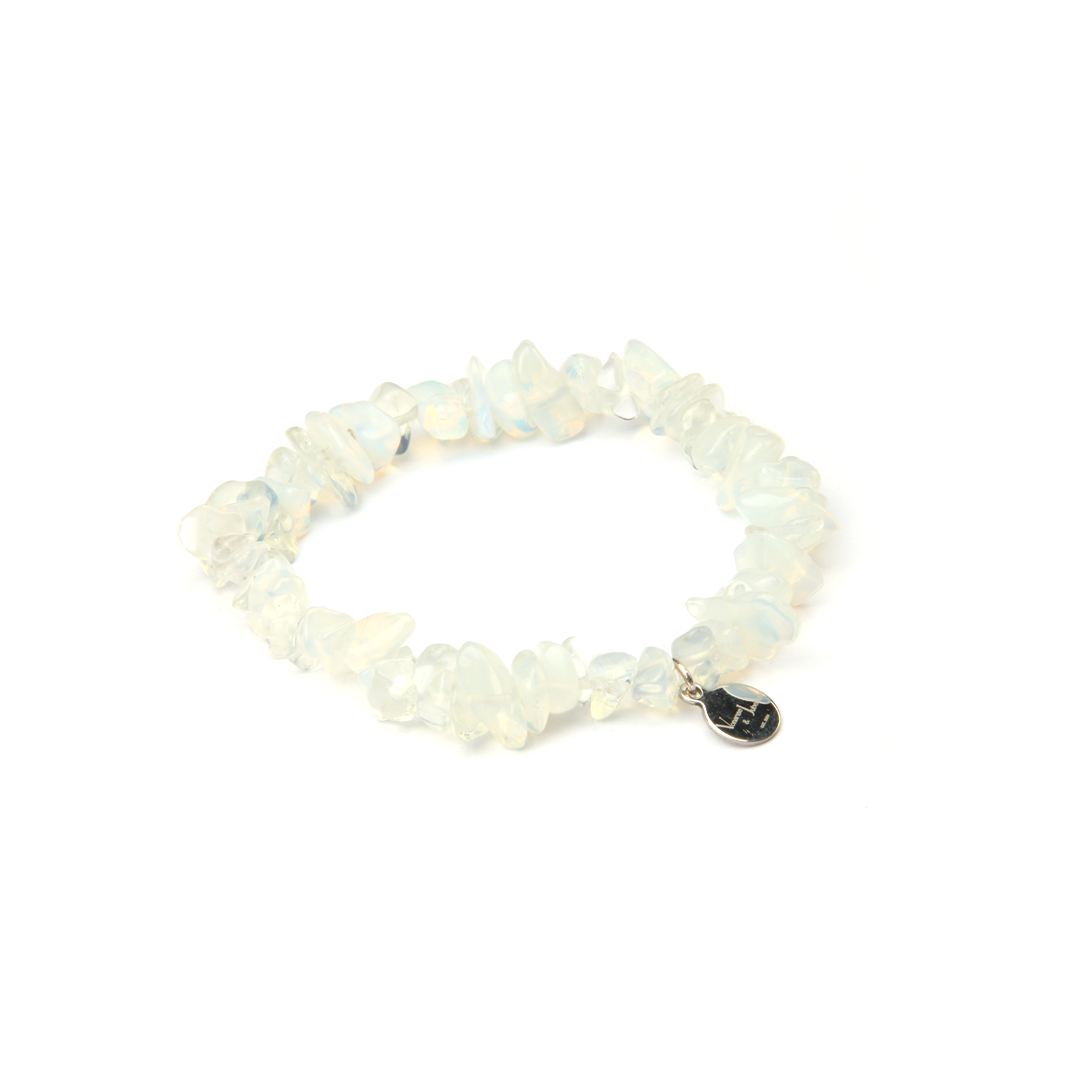 Minimalist chip crystal bracelet with raw-shaped opal stones, showcasing an ethereal and natural crystal style