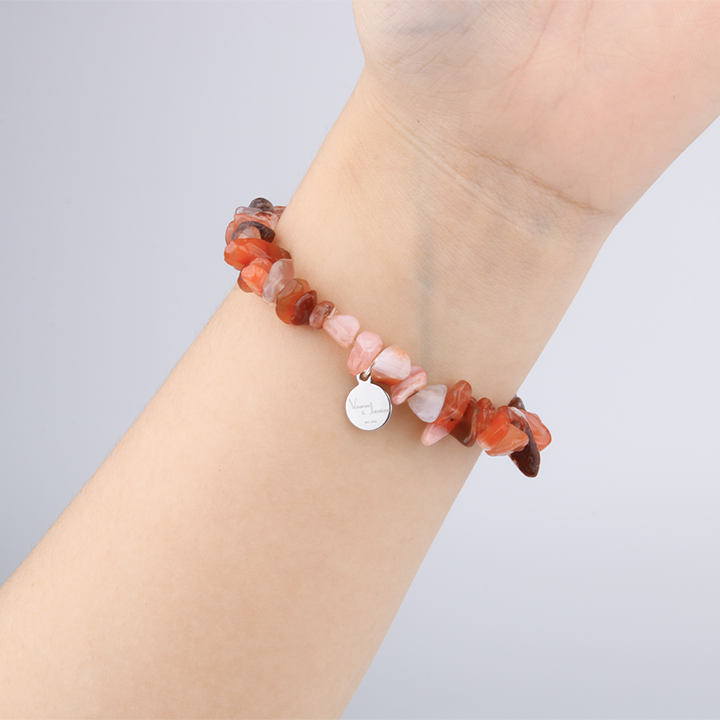Minimalist chip crystal bracelet with raw-shaped red agate, featuring deep earthy tones and grounding crystal energy