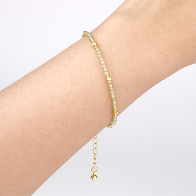 peridot with 18k gold accent minimalist crystal bracelet for fashion outfit grounding energy and growth feminine energy crystal jewelry