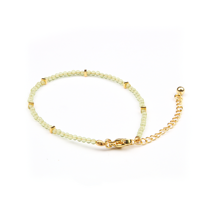 peridot with 18k gold accent minimalist crystal bracelet for fashion outfit grounding energy and growth feminine energy crystal jewelry