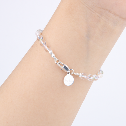 Minimalist bracelet with clear quartz, round strawberry rose quartz, round peridot, and freshwater pearl
