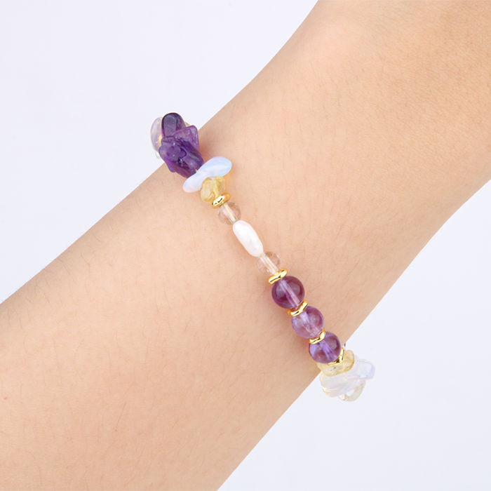 Elegant crystal bracelet featuring amethyst, raw-shaped citrine, opal, freshwater pearl, 18K gold raw beads, and clear quartz