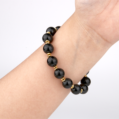 black tourmaline with 18k gold accent minimalist crystal bracelet for fashion outfit grounding energy and energy sheild crystal jewelry