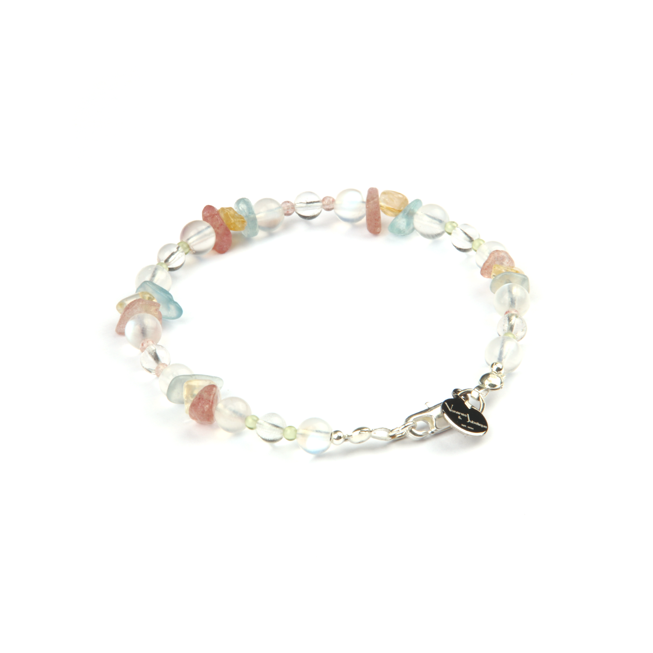 Delicate beaded bracelet with blue moonstone, clear quartz, strawberry rose quartz, aquamarine, and peridot in raw or round-shaped beads