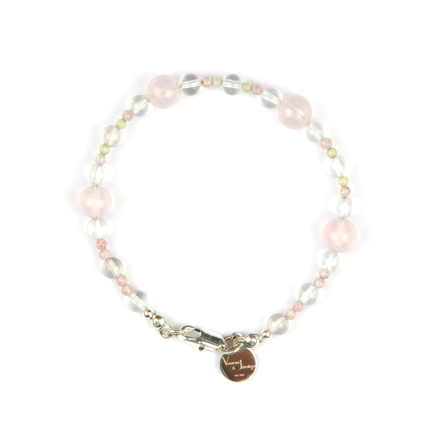 Minimalist bracelet with clear quartz, strawberry rose quartz, peridot, and starlight rose quartz