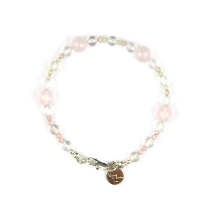 Minimalist bracelet with clear quartz, strawberry rose quartz, peridot, and starlight rose quartz