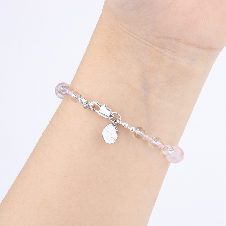 Minimalist bracelet with clear quartz, strawberry rose quartz, peridot, and starlight rose quartz