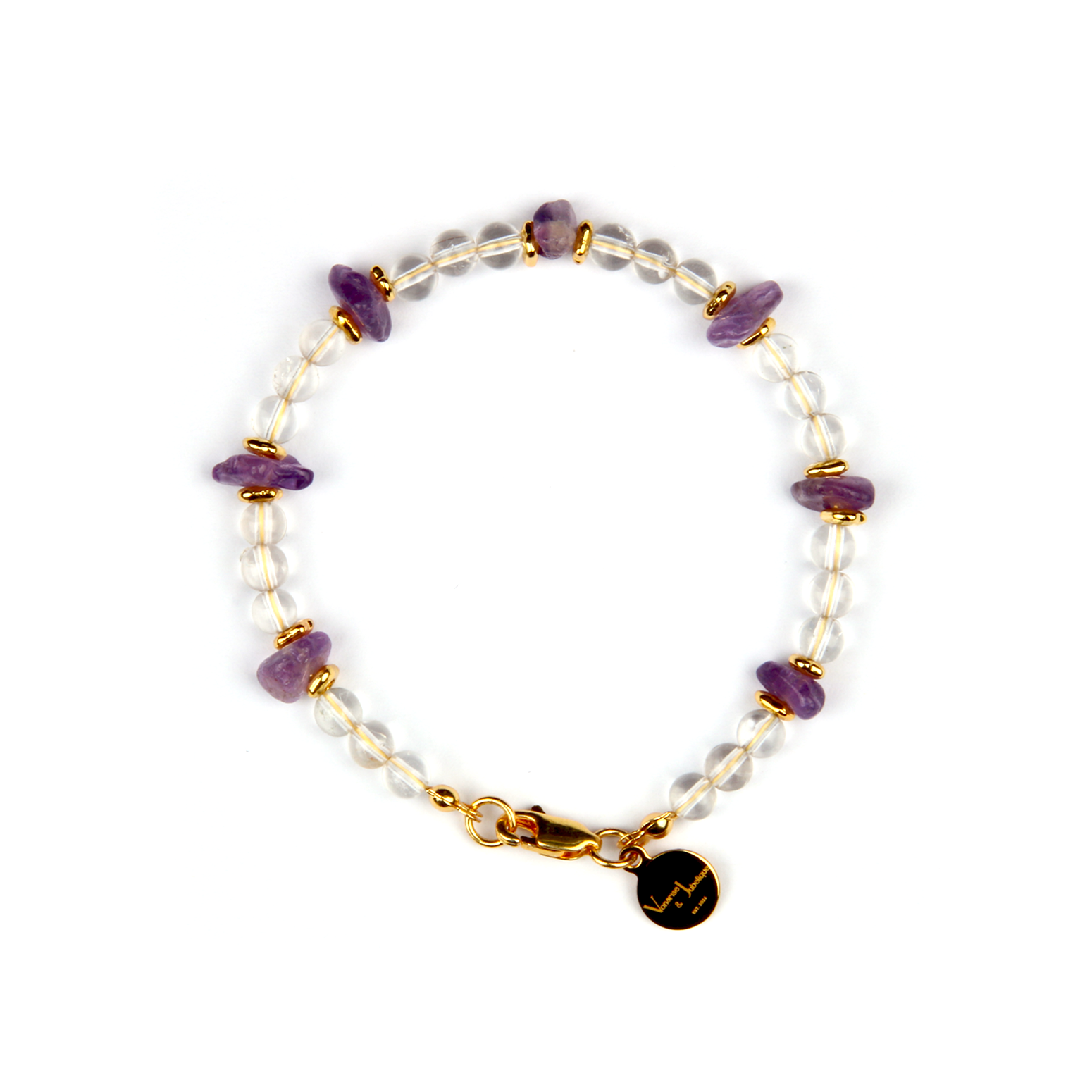Minimalist crystal bracelet with clear quartz, raw-shaped amethyst, and 18K gold raw beads