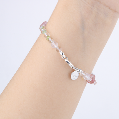 Elegant bracelet with clear quartz, blue moonstone, strawberry rose quartz, peridot, freshwater pearl, starlight rose quartz, and opal