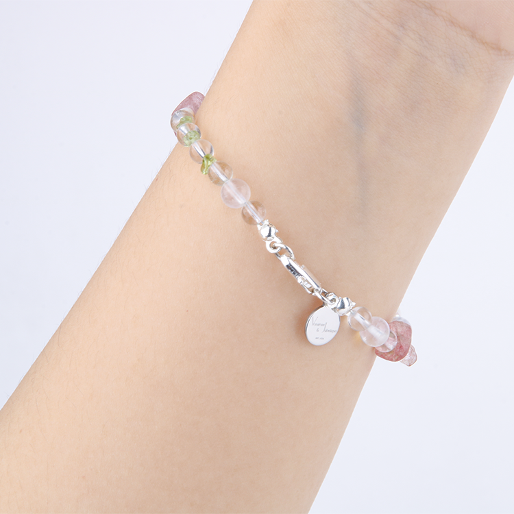 Elegant bracelet with clear quartz, blue moonstone, strawberry rose quartz, peridot, freshwater pearl, starlight rose quartz, and opal