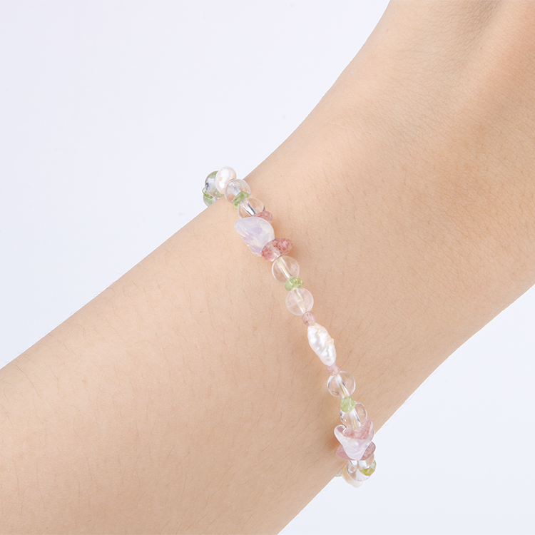 Minimalist bracelet with raw-shaped peridot, strawberry rose quartz, opal, clear quartz, and freshwater pearl