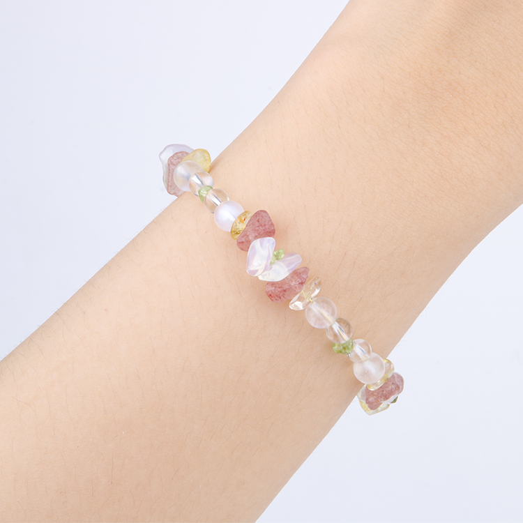 Minimalist bracelet with clear quartz, strawberry rose quartz, raw-shaped peridot, opal, citrine, and clear quartz beads
