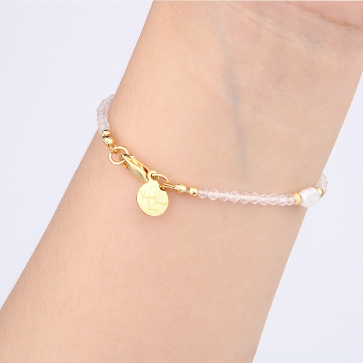 Minimalist extra thin crystal bracelet with freshwater pearls, 2mm faceted clear quartz, and 18K gold cat’s eye threaded beads, 2-5mm overall