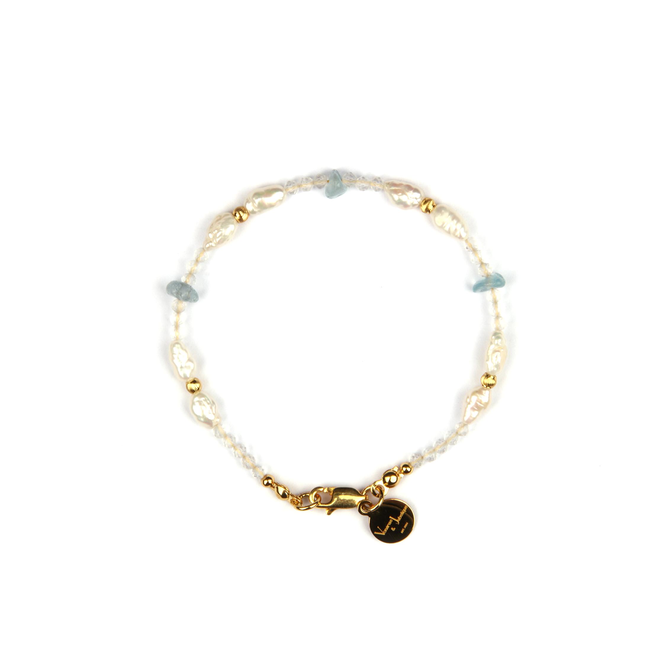 Minimalist extra thin crystal bracelet with freshwater pearls, chip aquamarine, 2mm faceted clear quartz, and 18K gold cat’s eye threaded beads, 2-5mm overall
