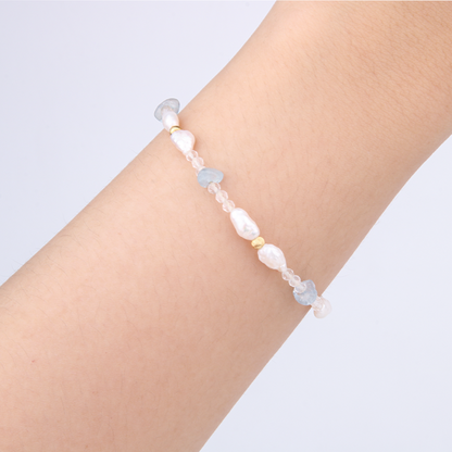 Minimalist extra thin crystal bracelet with freshwater pearls, chip aquamarine, 2mm faceted clear quartz, and 18K gold cat’s eye threaded beads, 2-5mm overall