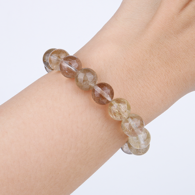 golden rutilated quartz crystal bracelet for abundance attraction