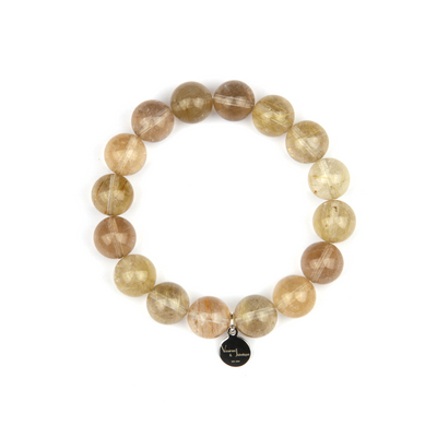 golden rutilated quartz crystal bracelet for abundance attraction
