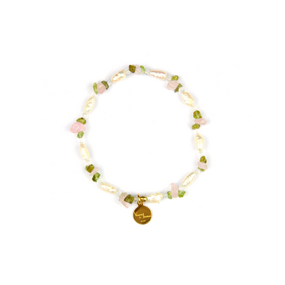 raw shape freshwater pearl with peridot and rose quartz bracelet