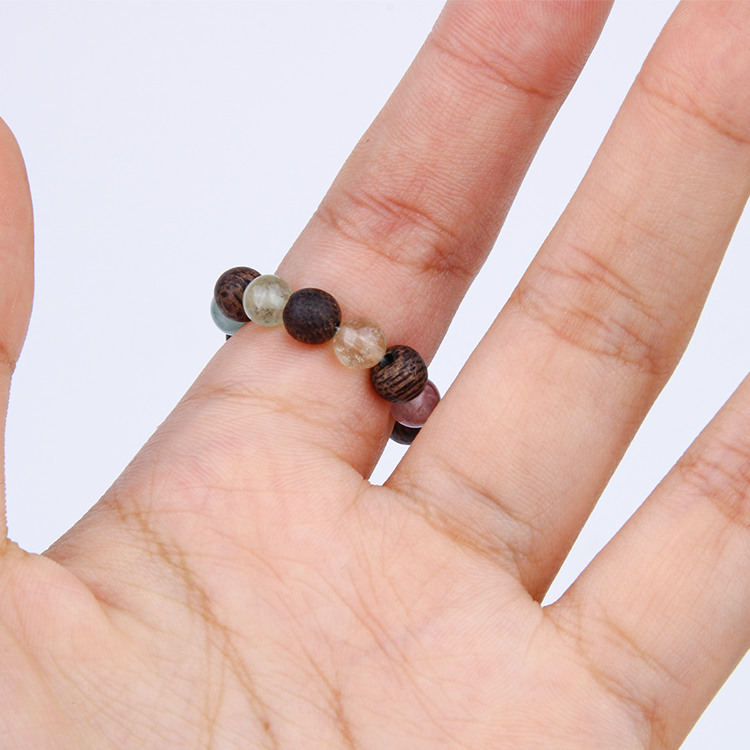 fashion and minimalist jewlery with wood and rainbow tourmaline beaded ring 