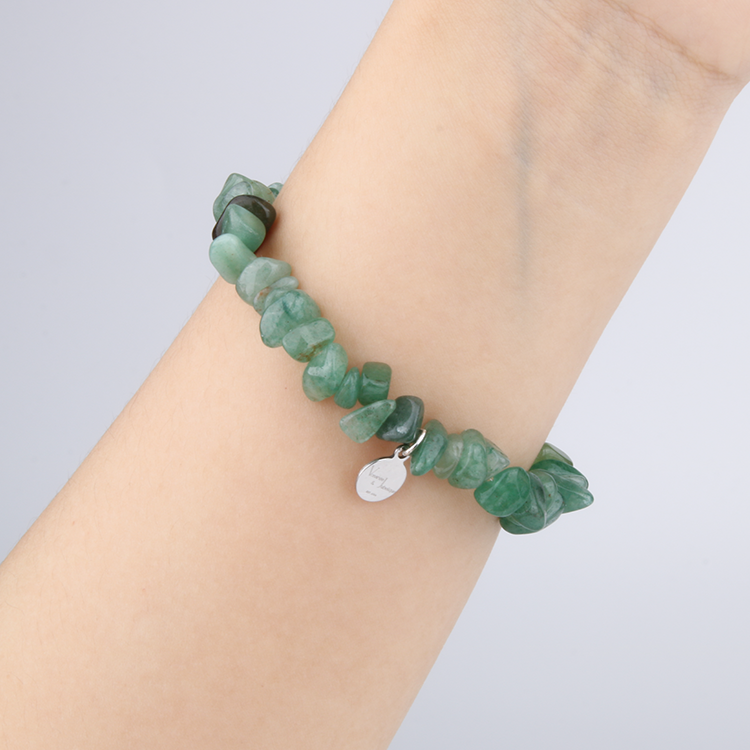 Minimalist chip crystal bracelet with raw-shaped aventurine stones, featuring a fresh green tone and natural healing crystal charm