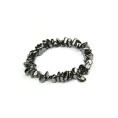 Minimalist chip crystal bracelet with raw-shaped hematite stones, offering a sleek and grounding metallic crystal look
