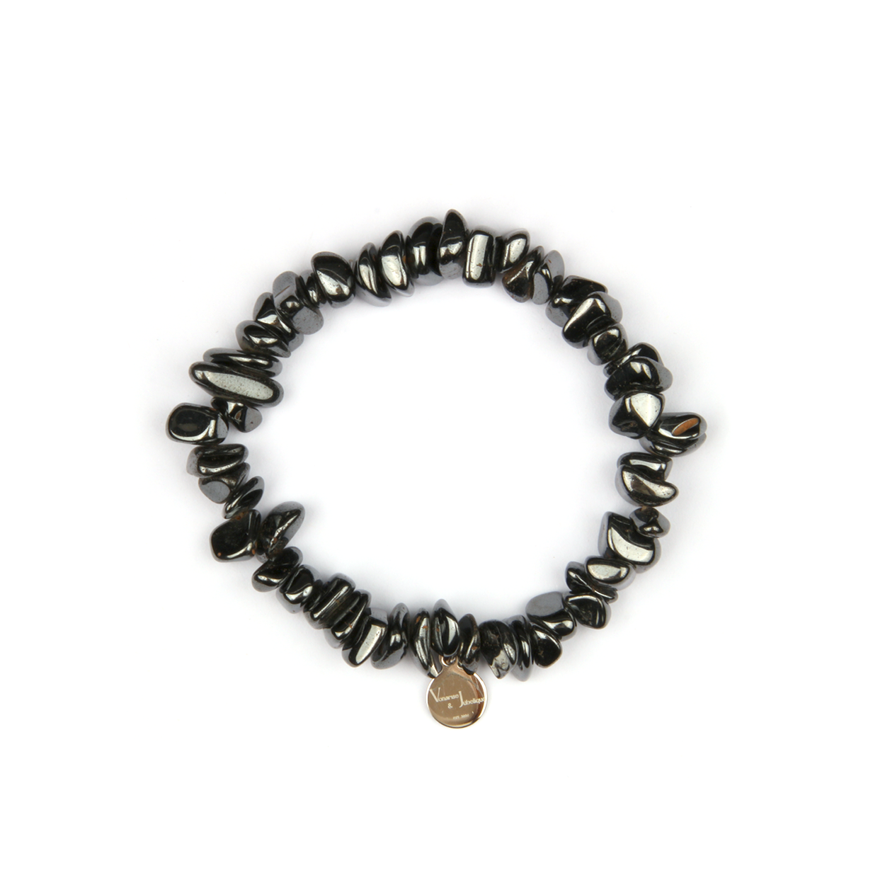 Minimalist chip crystal bracelet with raw-shaped hematite stones, offering a sleek and grounding metallic crystal look