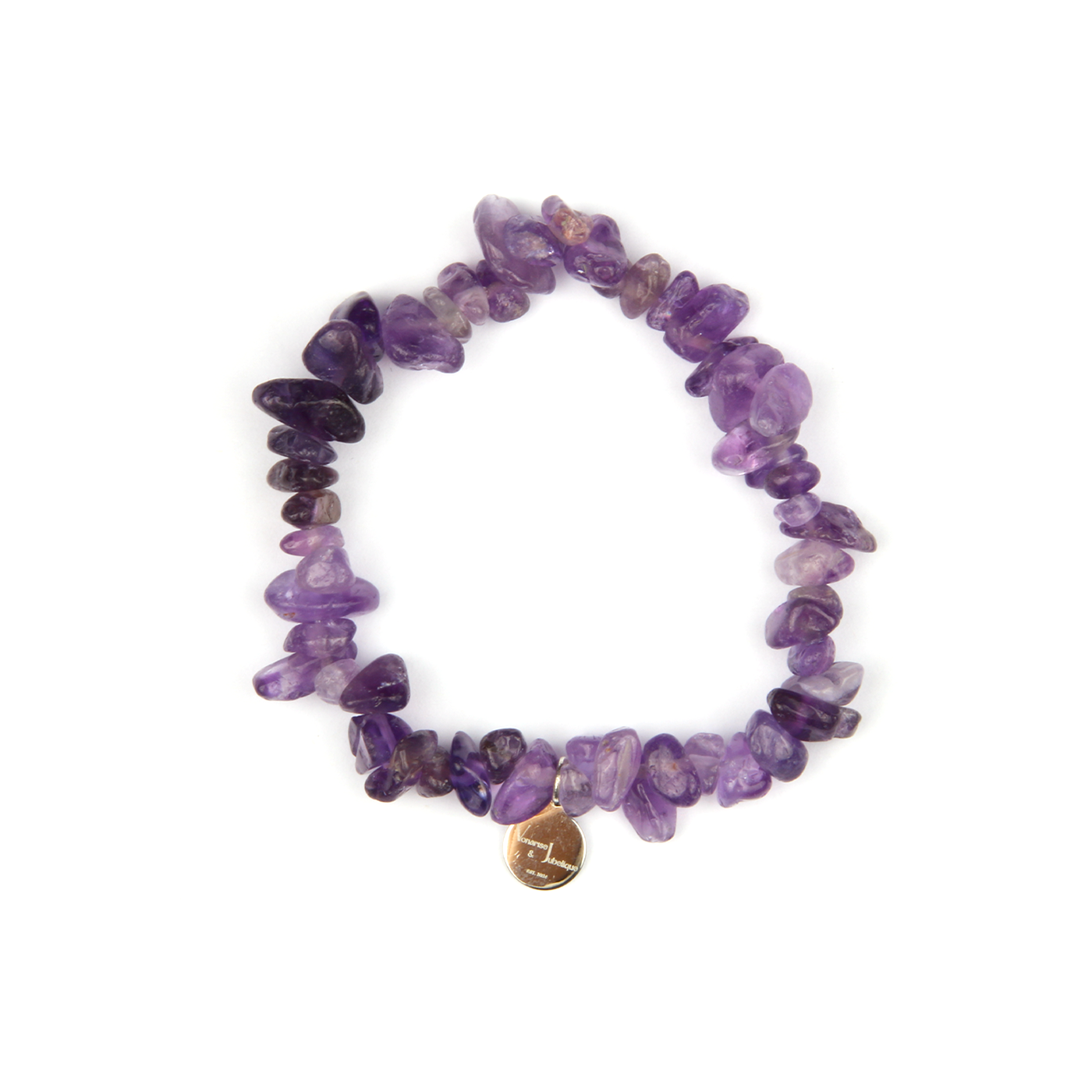 Minimalist chip crystal bracelet with raw-shaped amethyst, showcasing deep purple tones and soothing spiritual energy