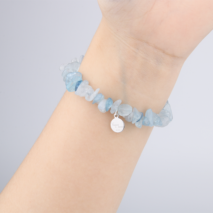 Minimalist chip crystal bracelet with raw-shaped aquamarine, featuring tranquil blue tones and calming oceanic crystal energy