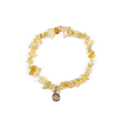 Minimalist chip crystal bracelet with raw-shaped citrine, showcasing golden hues and vibrant positive energy