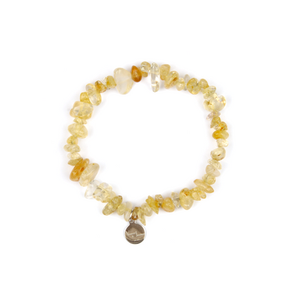 Minimalist chip crystal bracelet with raw-shaped citrine, showcasing golden hues and vibrant positive energy