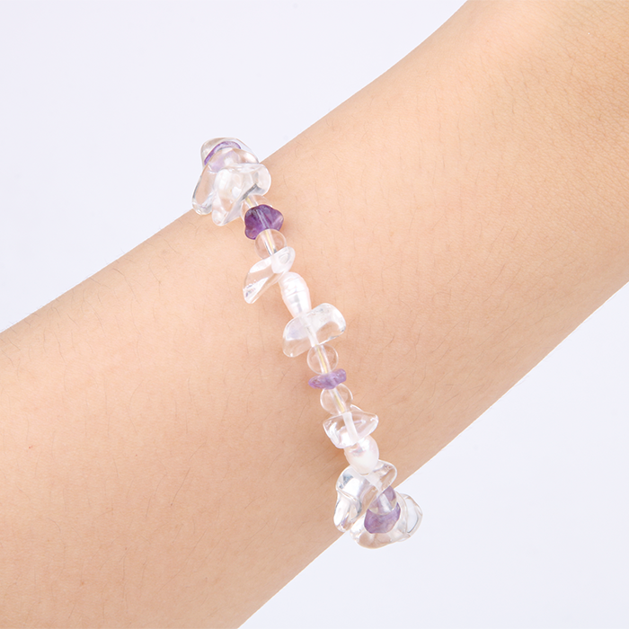 Minimalist bracelet with raw-shaped clear quartz, small round clear quartz, raw amethyst, and freshwater pearls