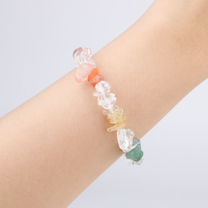 Rainbow chip crystal bracelet with raw-shaped clear quartz, strawberry rose quartz, red agate, citrine, aventurine, aquamarine, and amethyst in a minimalist design