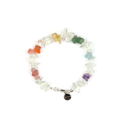 Rainbow chip crystal bracelet with raw-shaped clear quartz, strawberry rose quartz, red agate, citrine, aventurine, aquamarine, and amethyst in a minimalist design