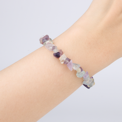 Minimalist chip crystal bracelet with raw-shaped fluorite, featuring multicolored hues and balancing crystal energy