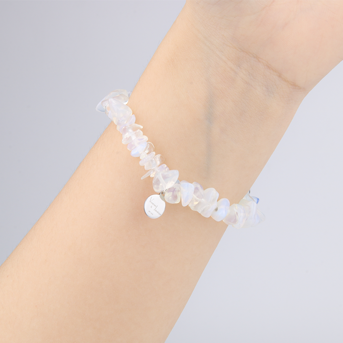 Minimalist chip crystal bracelet with raw-shaped opal stones, showcasing an ethereal and natural crystal style