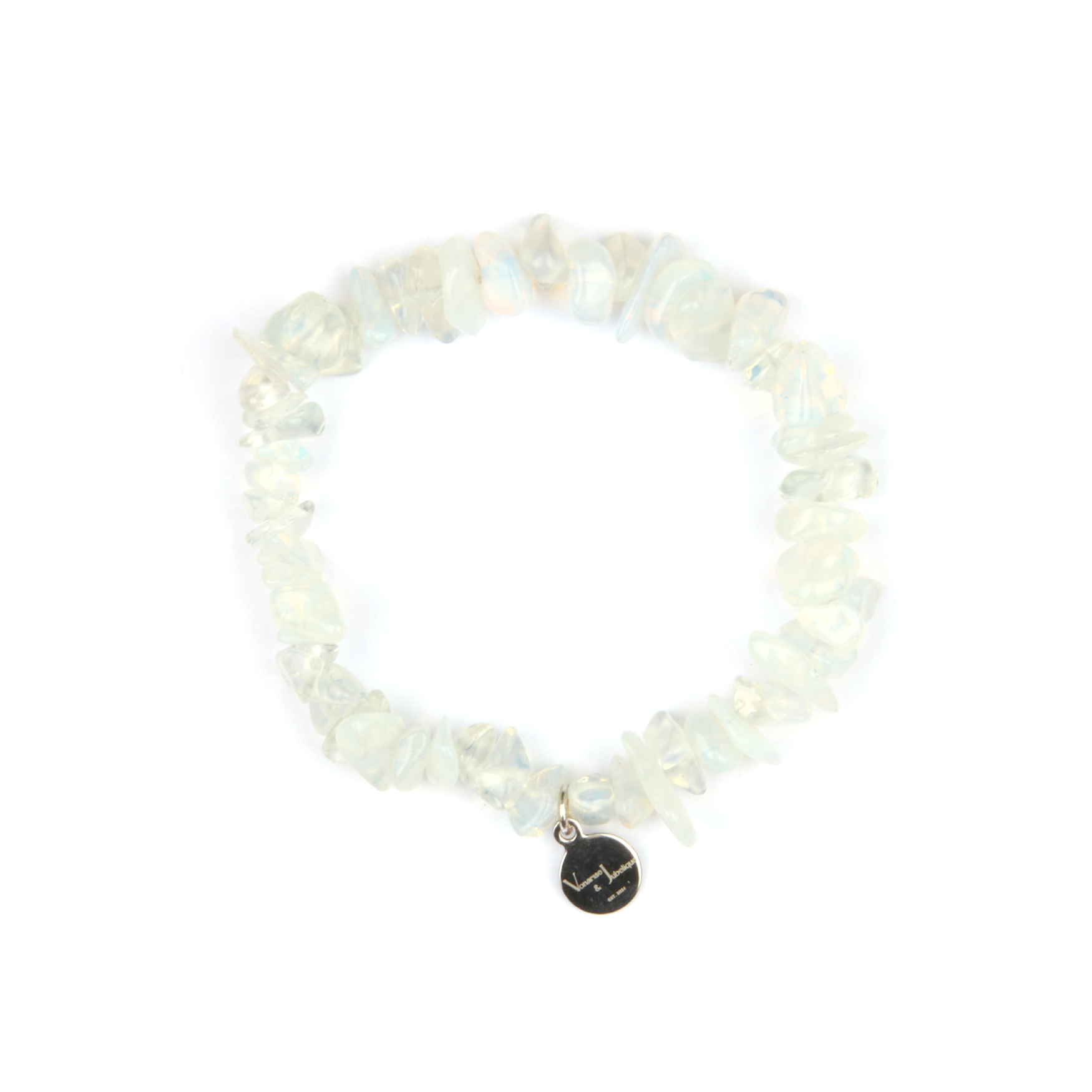 Minimalist chip crystal bracelet with raw-shaped opal stones, showcasing an ethereal and natural crystal style
