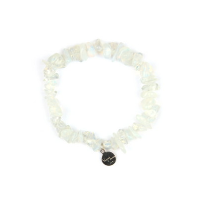 Minimalist chip crystal bracelet with raw-shaped opal stones, showcasing an ethereal and natural crystal style