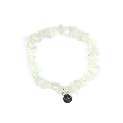 Minimalist chip crystal bracelet with raw-shaped opal stones, showcasing an ethereal and natural crystal style
