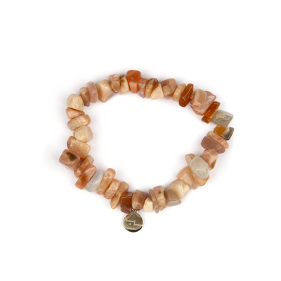 Minimalist chip crystal bracelet with raw-shaped sunstone, radiating warm tones and uplifting crystal energy