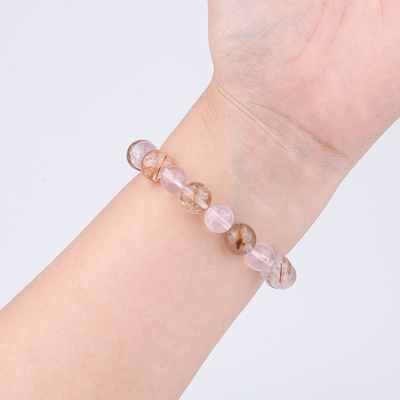 rose quartz and rutilated quartz crystal bracelet for love attraction and aundance attraction crystal jewelry