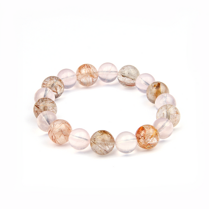 rose quartz and rutilated quartz crystal bracelet for love attraction and aundance attraction crystal jewelry